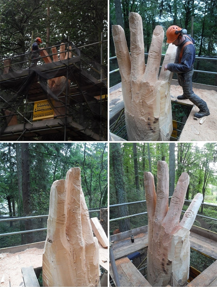 sculptor turns damaged tree into hand sculpture