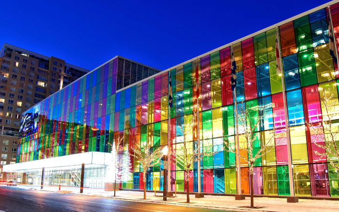 a building covered in Maigue's solar panels