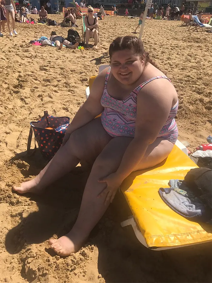 chubby girl wears a swimsuit