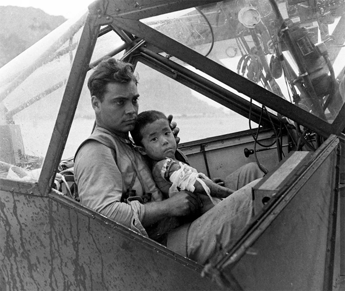 rare photos american soldier cradles a wounded japanese boy