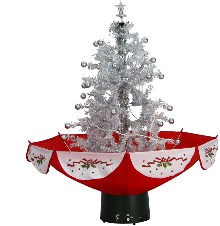 white christmas tree with red umbrella base