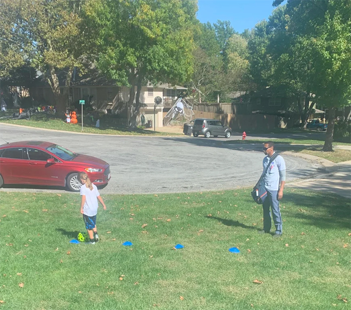 wholesome things mailman teaches girl soccer