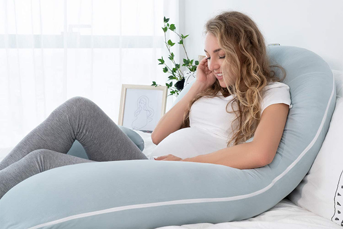 green jersey maternity pillows upright position