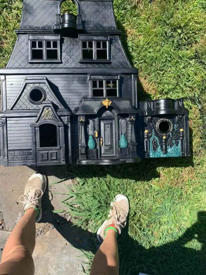 samantha adds subtle colors to the matte black dollhouse