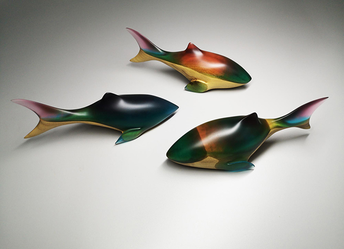 colorful wooden sharks with epoxy resin