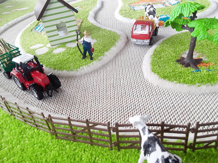 farm-inspired playmat raised detailing