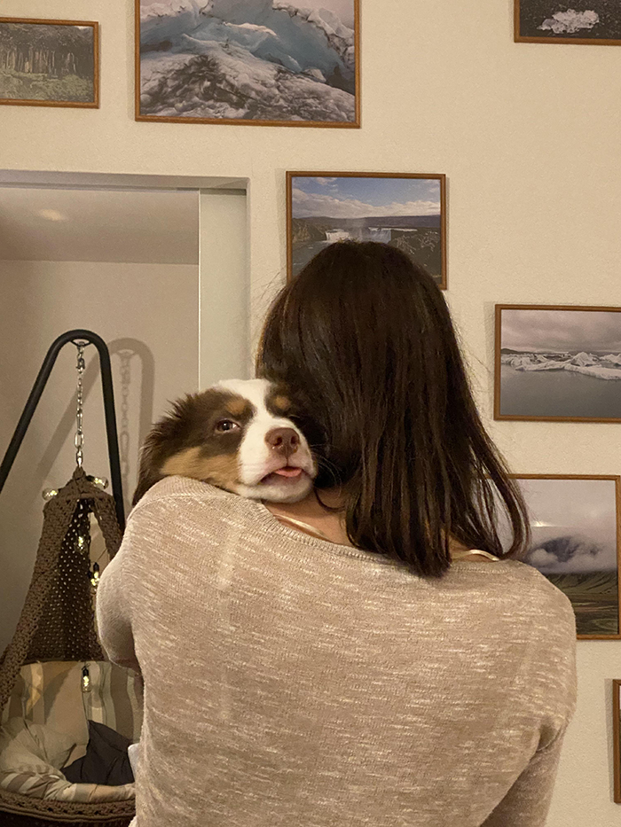 girlfriend hugging dog