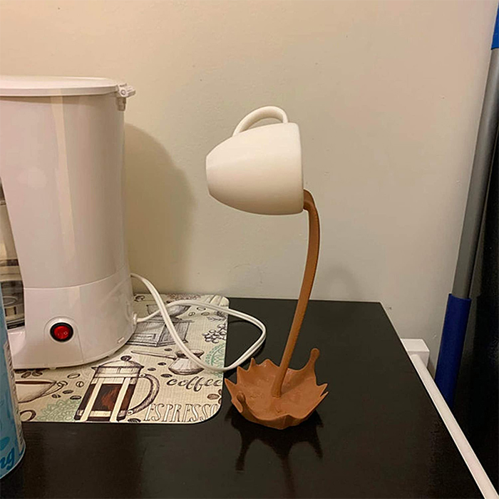 spilling coffee mug decor