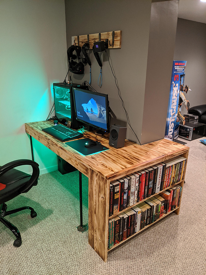 wooden desk with integrated bookshelves