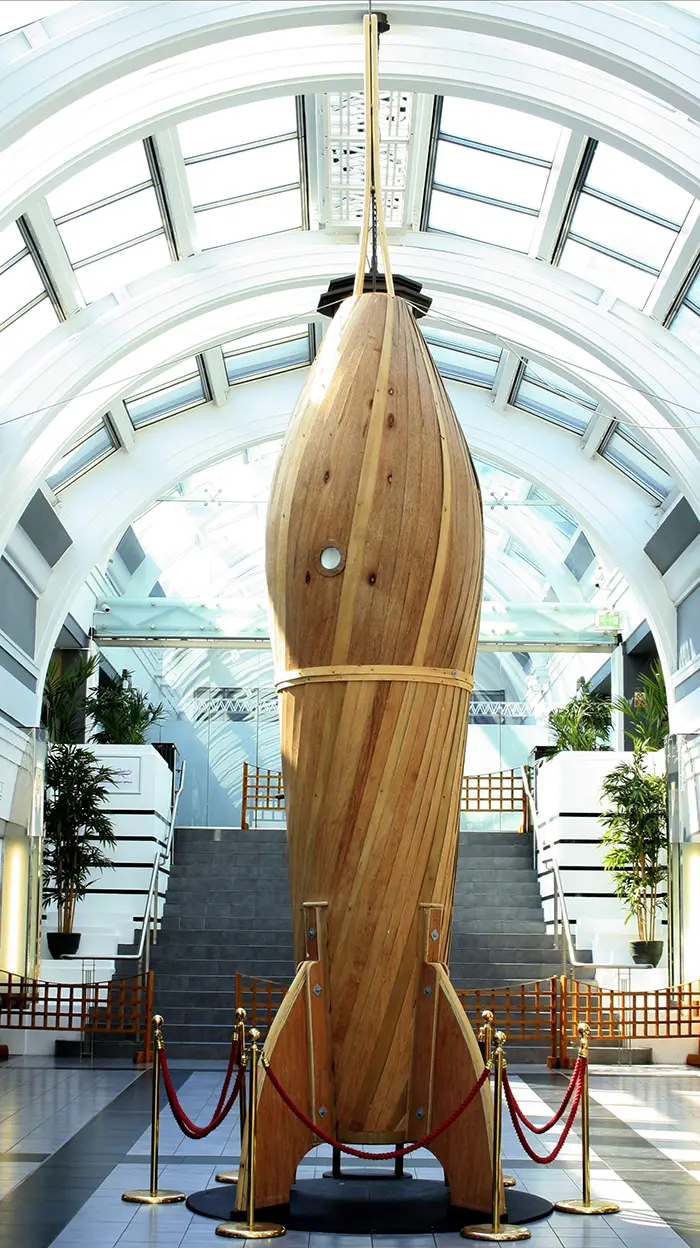 wooden rocket sculpture