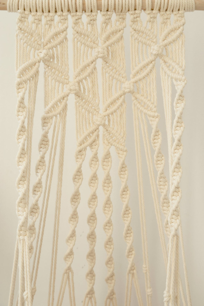 detail shot of the natural white flower-patterned hanging cat hammocks