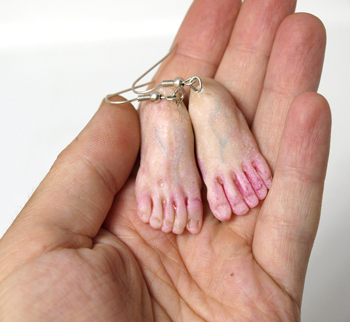 weirdsculpture human foot dangling earrings