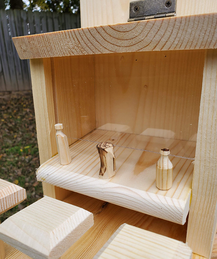 withliftedhandsy wooden outdoor critter feeder