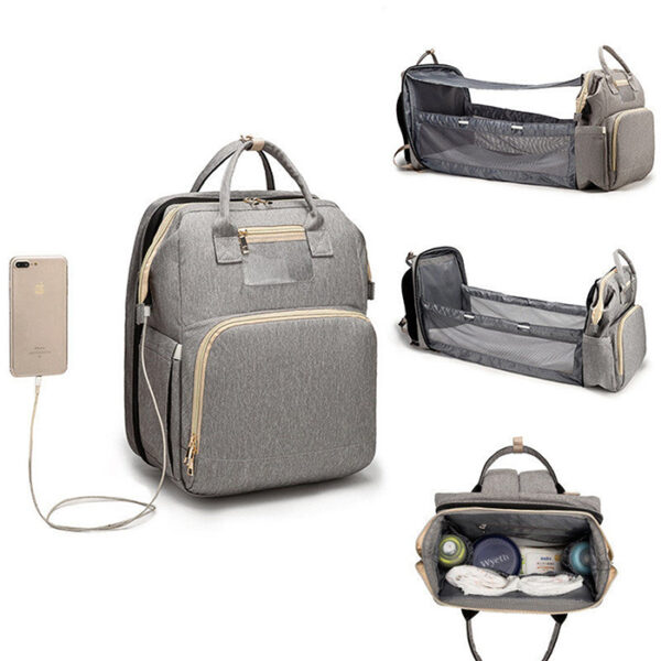 This Multifunctional Baby Bag Expands Into A Changing Station/Crib