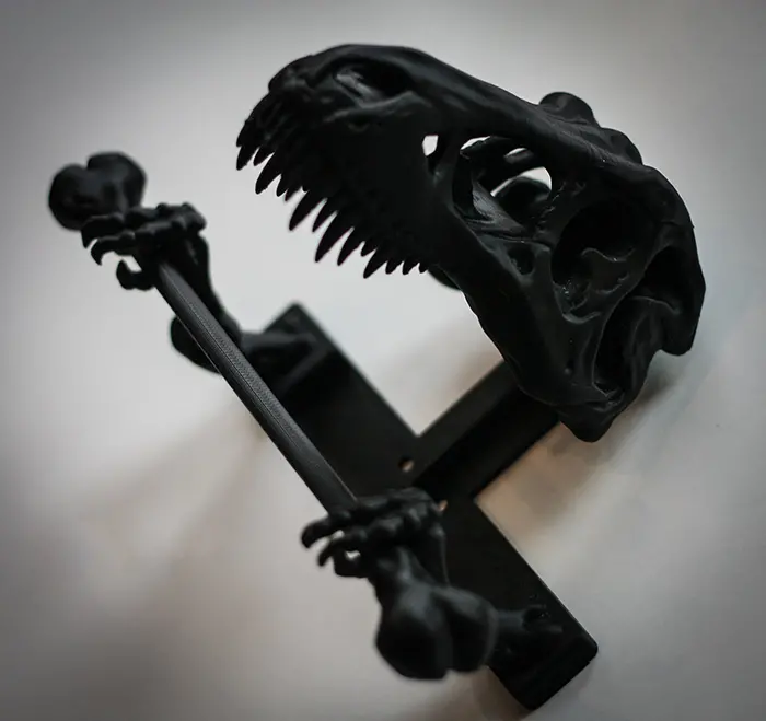 dinosaur skull tissue dispenser black