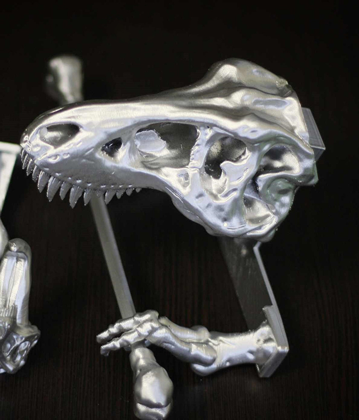 t-rex skeleton toilet paper holder silver