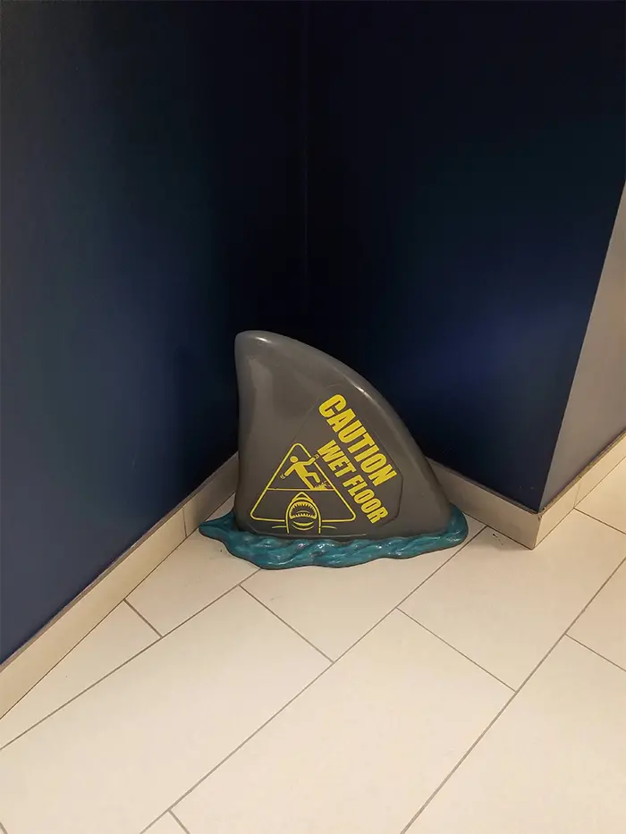 brilliant designs shark fin wet floor sign