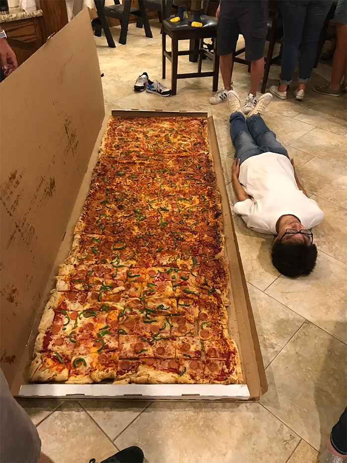 comparison images large pizza vs human