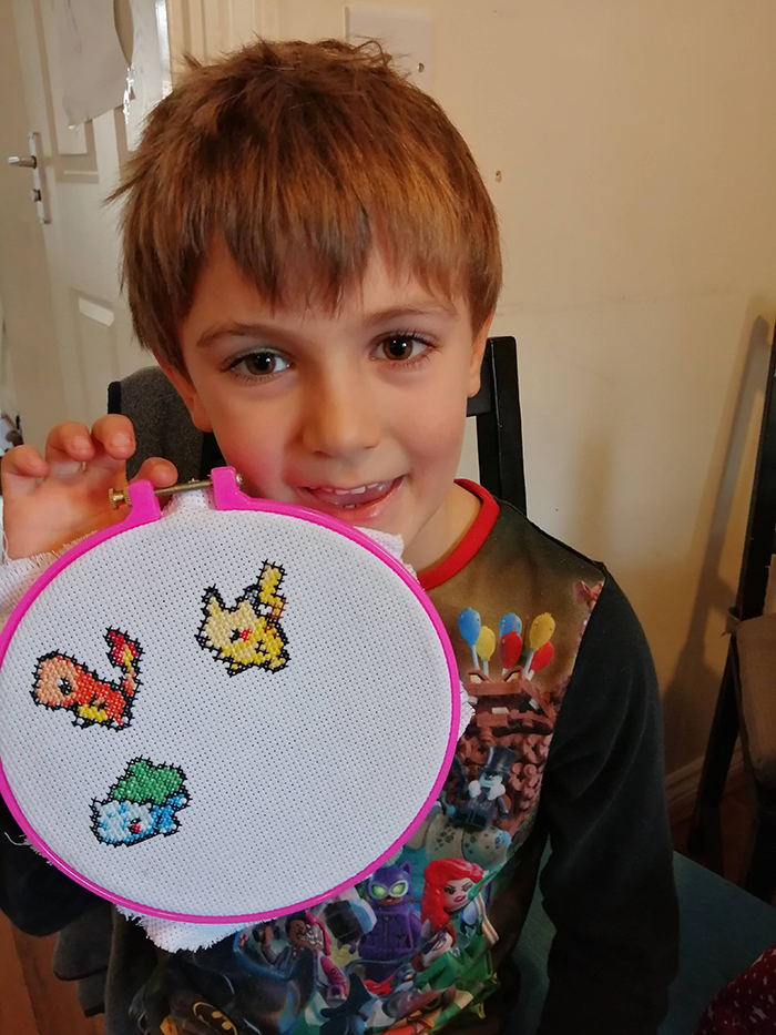 cross-stitch art pokemon by six-year-old boy