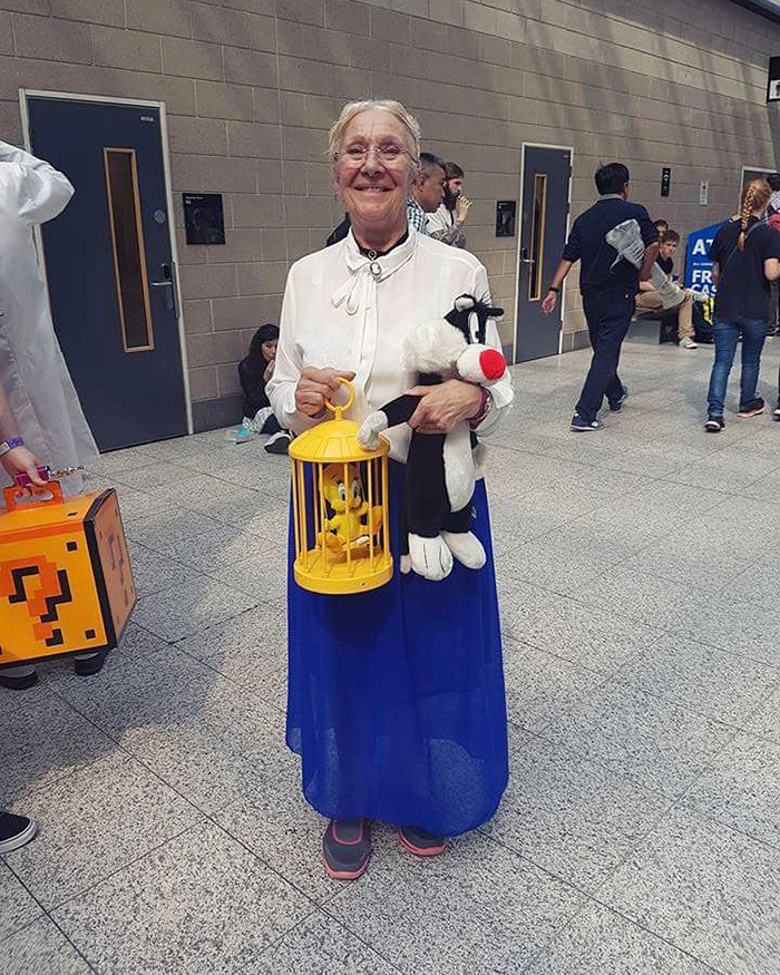 old people being wholesome woman in looney tunes granny costume