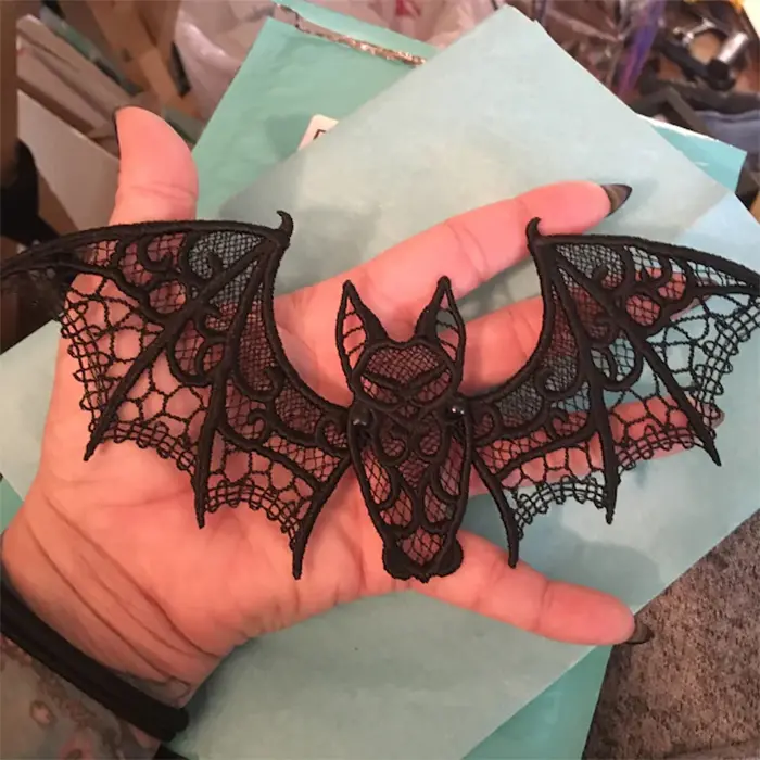 embroidered lace bat with movable wings