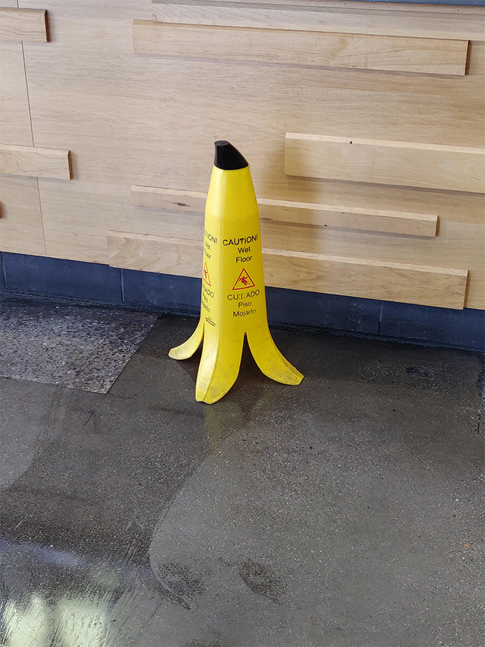 slippery floor caution sign banana peel