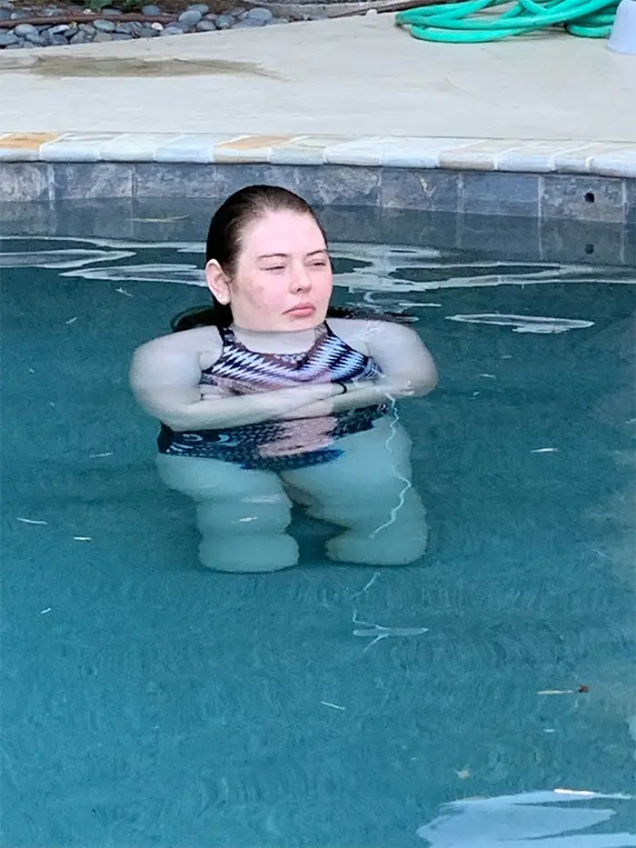 awkward shot of lady in pool