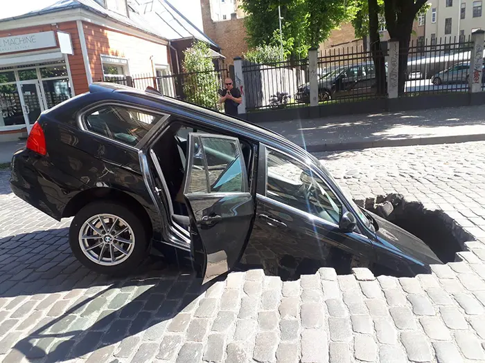 car fallen into sinkhole