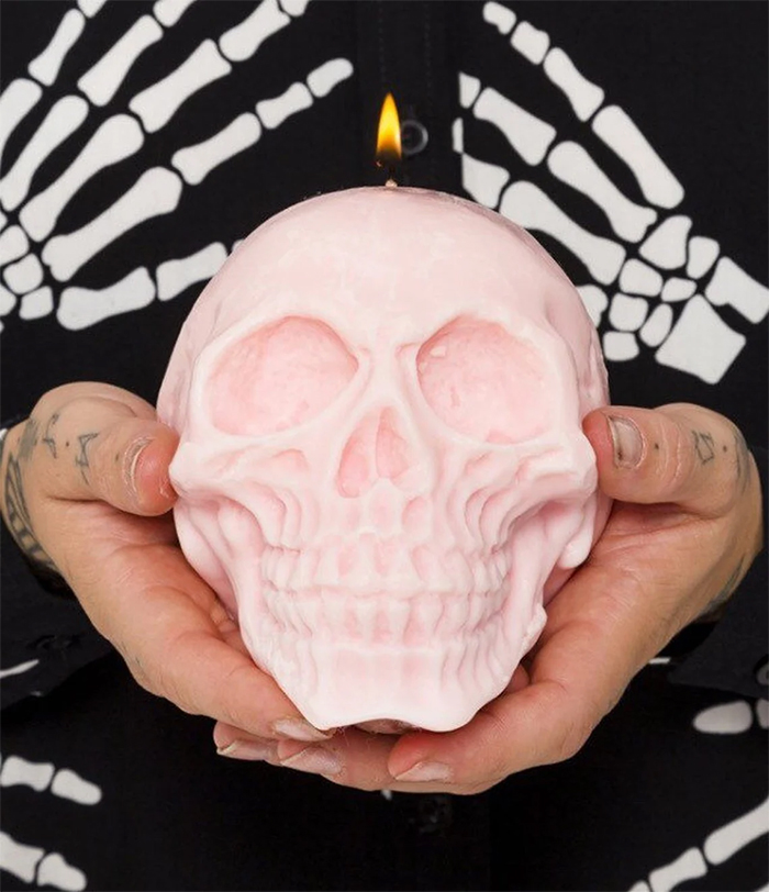 large skull candle pastel pink