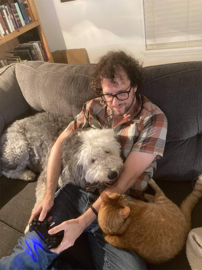cute pets human playing video game