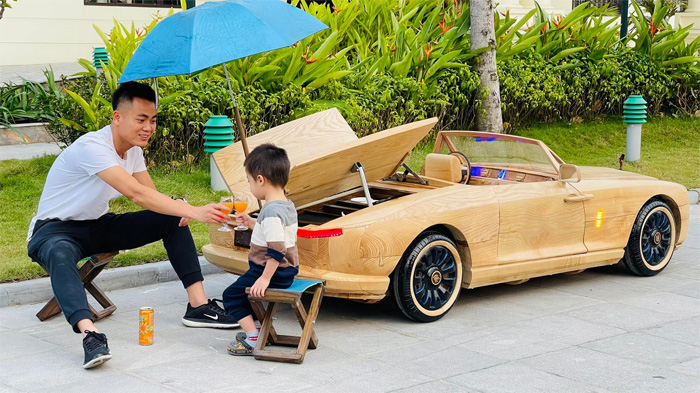 dad builds luxury car out of wood for his son