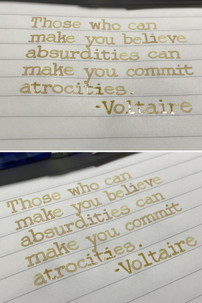 decorative writing voltaire quote