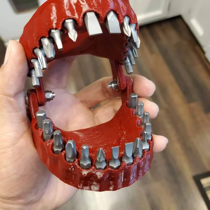 denture driver bit holder hinged jaws