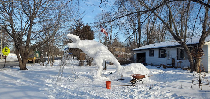 t-rex snow sculpture making