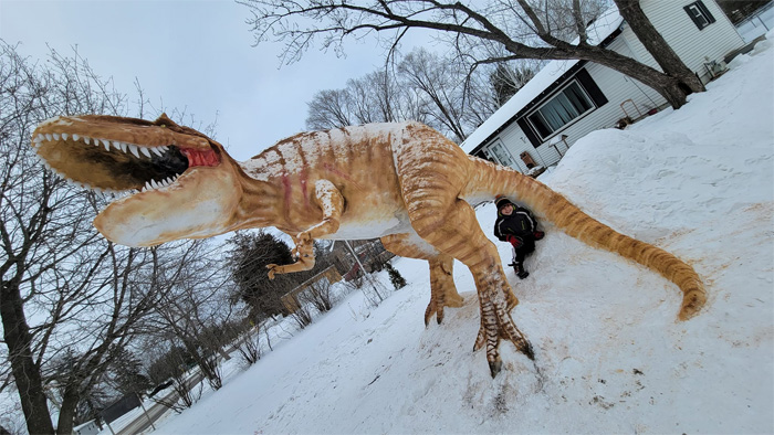 t-rex snow sculpture paul larcom minnesota