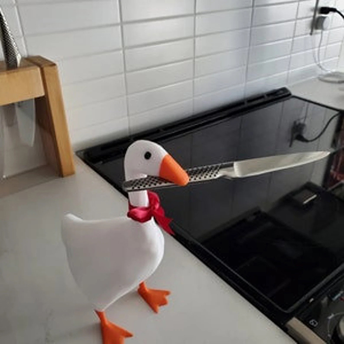 3d printed magnetic goose figurine with knife in beak