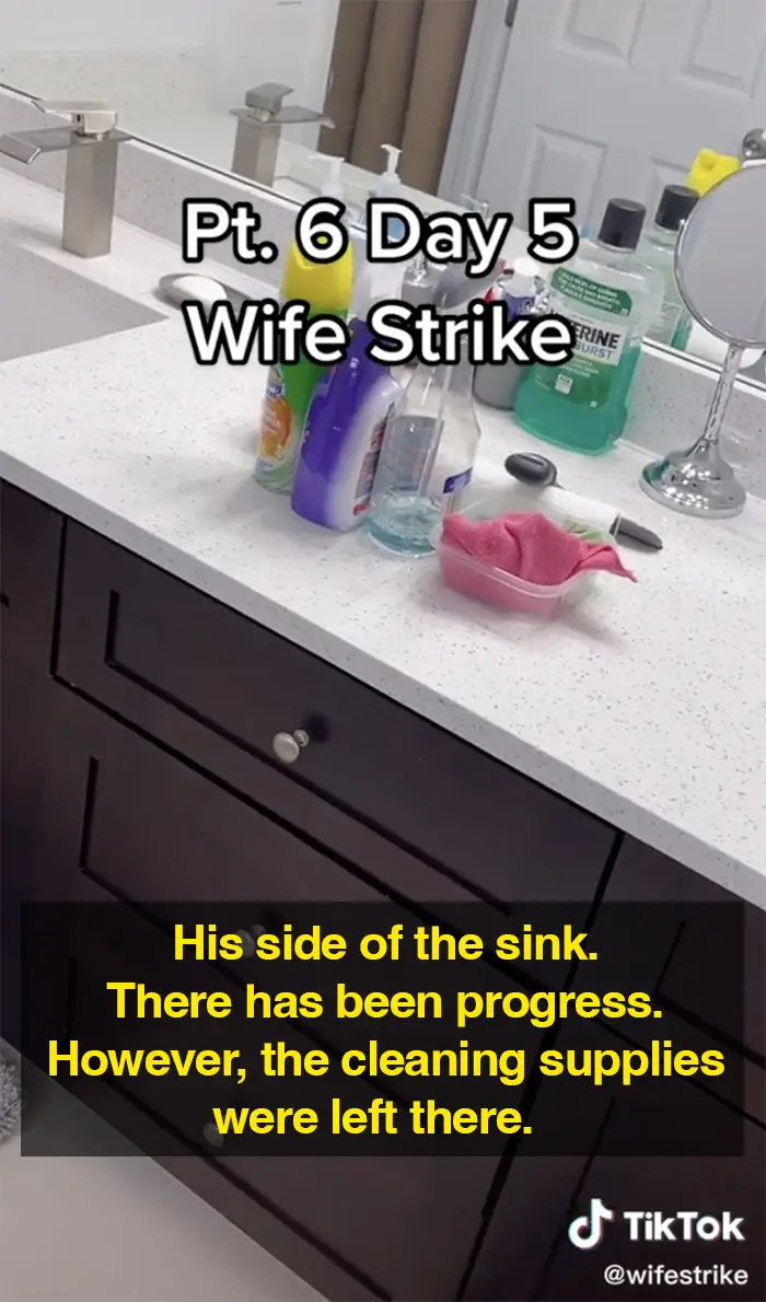 wife strike cleaning supplies on bathroom vanity top